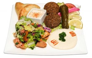 vegetarian-plate-lebanese-food-fattoush-salad-hummus-stuffed-grape-leaves-dolmas-falafel